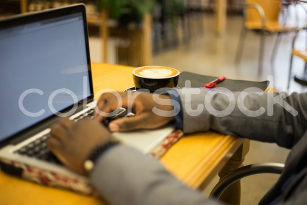 man at keyboard color stock