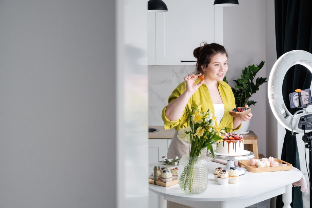 image of a woman and a ring light on a blog post on how to Repurpose Short Videos